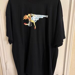 A Girl is a Gun Black Graphic T-Shirt with Gun and Pin-Up Design